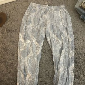 Olivaceous blue snakeskin joggers